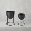 Century style metal stand with pot