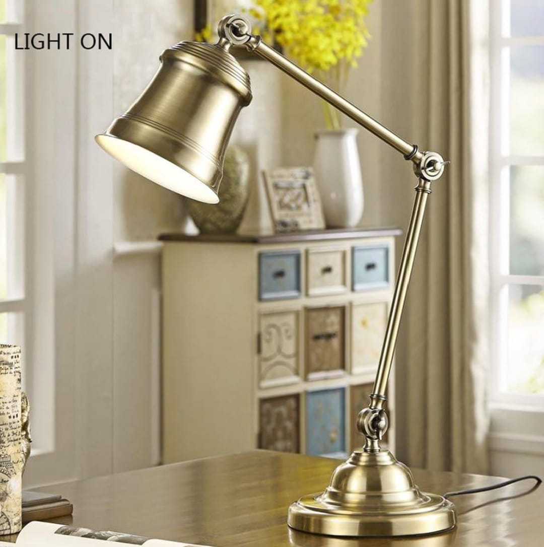 The Lumina Minimalist Brass Reading Lamp