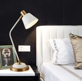 The Lumina Minimalist Brass Reading Lamp