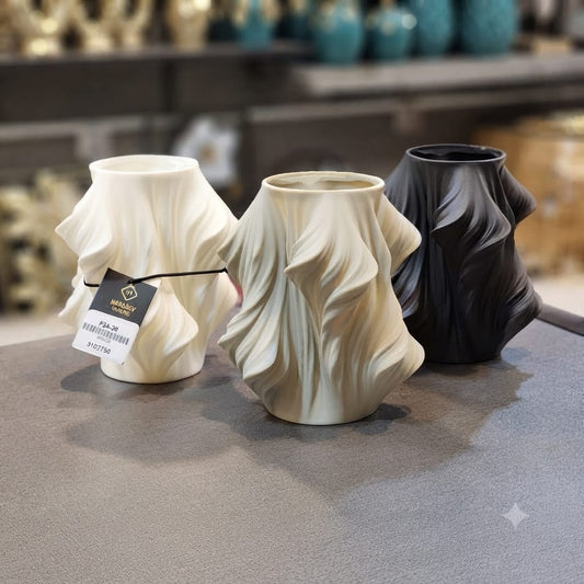 The Ripple & Fold Sculptural  Vase Collection
